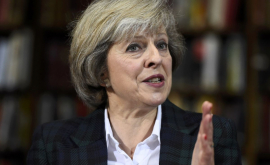 Theresa May criticată pentru apelul de a controla internetul