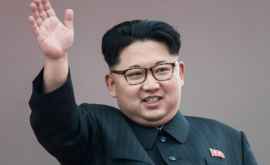 Primul portret oficial al lui Kim Jongun a fost expus FOTO