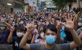 ONU Guvernele pot interzice protestele pe motive de sănătate publică